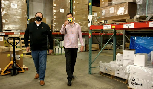 Crown Bank President/COO, Jeff Wessels, and ASI President of Operations, JR Anderson, discuss growth while touring the warehouse.